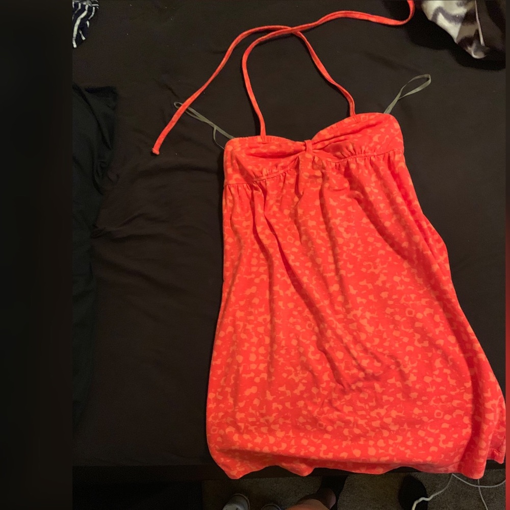 Red orange tube string dress.